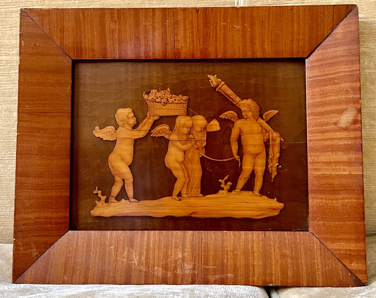 Tarsia lignea con figure di putti 