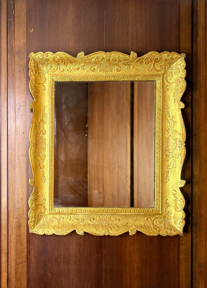 Specchiera in legno dorata e intagliata