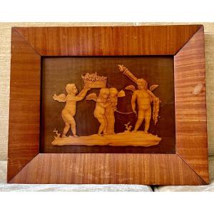 Tarsia lignea con figure di putti 
