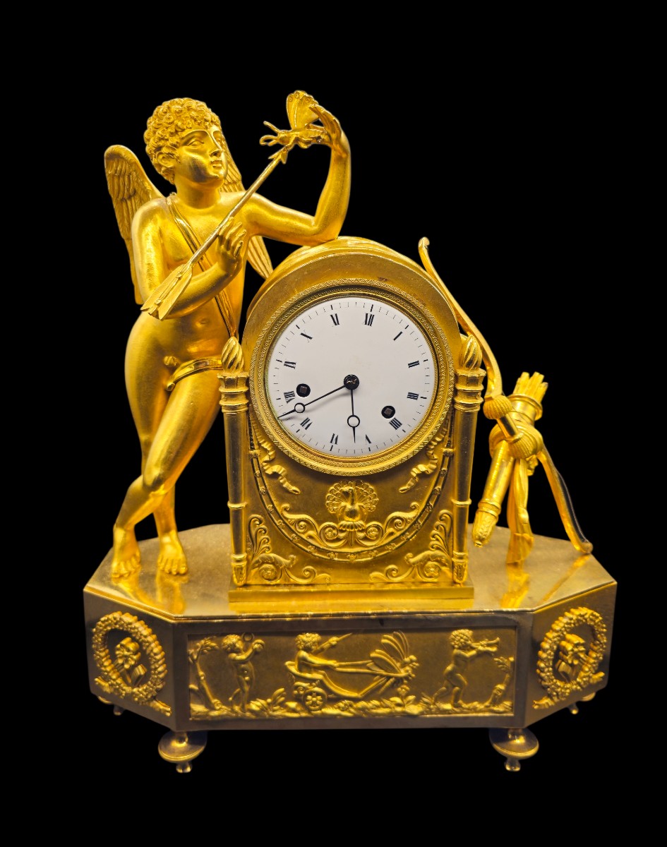 Orologio Direttorio, Cupido punge la farfalla