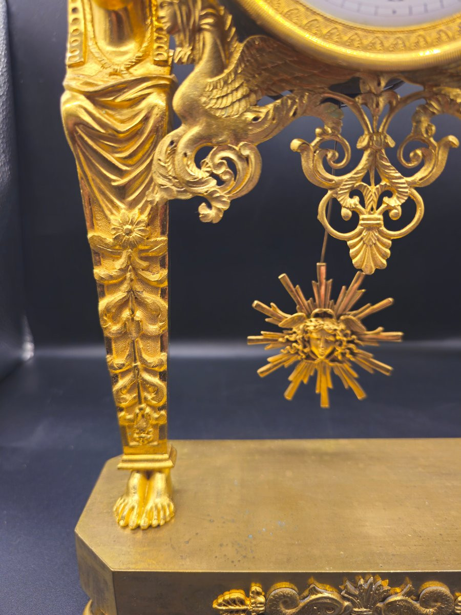 Orologio Impero Retour d’Égypte a Scheletro con Cariatidi in Bronzo Dorato a Fuoco-photo-1