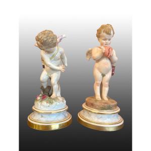 A Pair Of Meissen Putti On A Base 