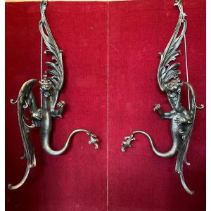 Pair Of Patinated Metal Sconces With Griffon Decor 