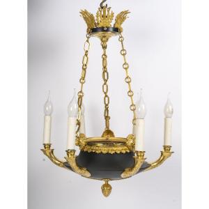 A Chandelier In The 1st Empire Style.