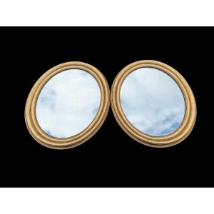 Pair Of Gilded Medallion Mirrors