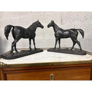 Sculptures Of A Stallion And His Mare 