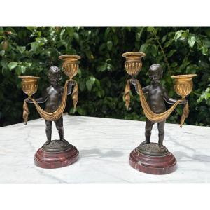 Pair Of Candlesticks With Cherubs, Cast By Susse