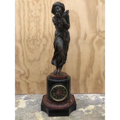 Clock Surmounted By A Bronze Woman Blowing In Her Hands To Warm Up