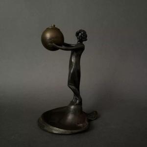 1900 Art Nouveau Statuette In Pewter Or Spelter Of A Woman Carrying A Ball