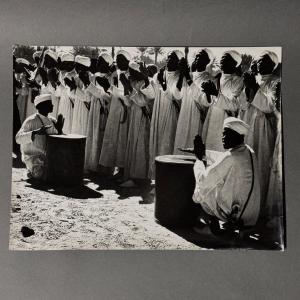 Glossy Black And White Photograph From 1960 Depicting Orientals With Drums