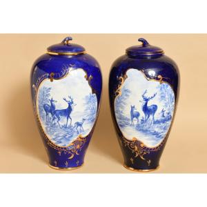 Pair Of Covered Vases