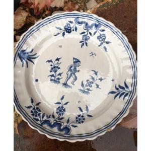18th Century Earthenware Plate With Grotesque Decor.
