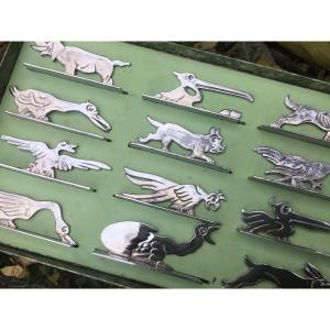 Suite Of 12 Silver Dlg Knife Holders By Benjamin Rabier
