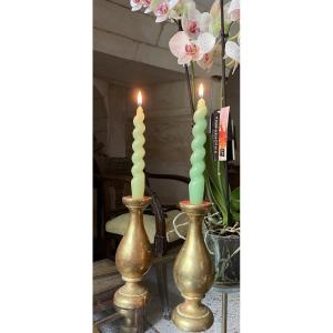 The Pair Of Small Candlesticks In Turned Wood And Gilded With Leaf 
