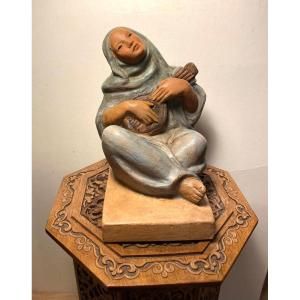 “the Musician”. Polychrome Terracotta Early 20th Century.