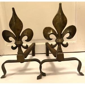Pair Of Early 20th Century Andirons. Bronze Fleur-de-lis. Iron Bases.