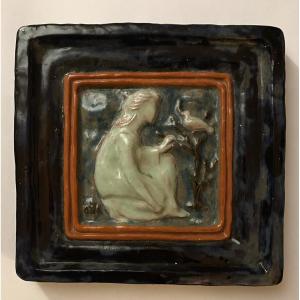 Mid-20th  Glazed Ceramic Plaque. Young Woman And Dove. 