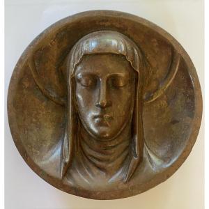 Bronze Medallion With Brown Patina, 19th . Haloed Face Of The Virgin Mary In High Relief.