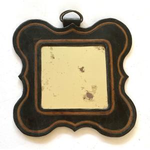 Art Populaire XIXème. Mirror. Cut-out Leather Frame