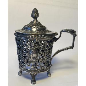 19th Silver Mustard Pot. Louis XVI Style . Medallions, Laurels, Roses And Knotted Ribbon.