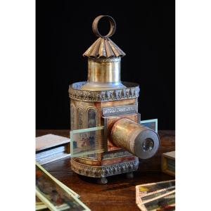 Magic Lantern And Painted Plaques. Nineteenth Century.