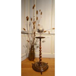 A Small Table With A Light. Seventeenth Century.