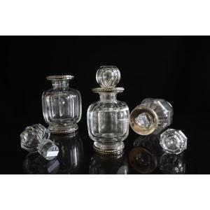 Three Bottles: Baccarat Crystal. Twentieth Century.