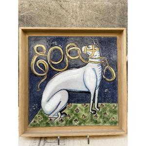 Ceramic Tile Depicting A White Dog.