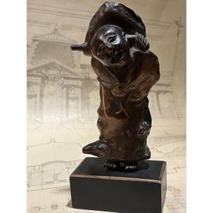 Carved Tree Root Depicting A Chinese Man.