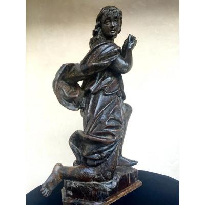 Statue Of St. In Prayer