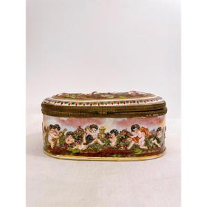 Oval Porcelain Box By Capo Di Monte, Decorated With Putti, Late 19th Century