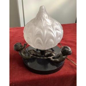 A Lamp With Three Cherubs