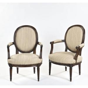 Pair Of Louis XVI Period Medallion Armchairs In Walnut