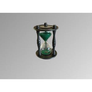 A 20th Century Pewter Hourglass.