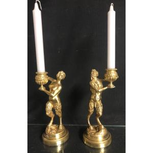 Paire de bougeoirs Début XIXe en bronze Faune et Faunesse