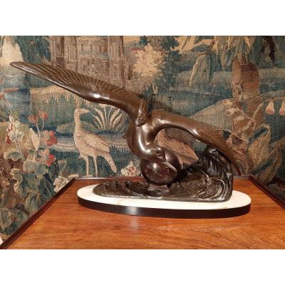 Patinated Regulates Sculpture Representing A Bird, Signed Irénée Rochard.