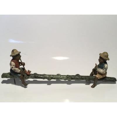 Nuremberg Lead Sculpture , Late Nineteenth Century. Two Black Men Sitting On A Tree Trunk.