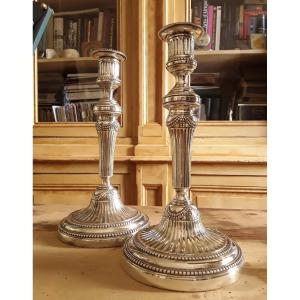 Pair Of Louis XVI Candlesticks.