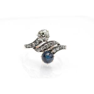 Antique Toi Et Moi Ring With Diamonds And Cabochon Cut Sapphire, Early 20th Century.