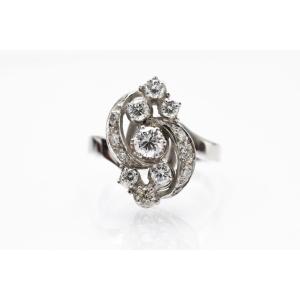 A Fancy Ring In White Gold With Diamonds