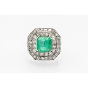 Ring With An Emerald And Diamonds.