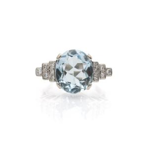 A Unique Ring Adorned With Aquamarine And Diamonds