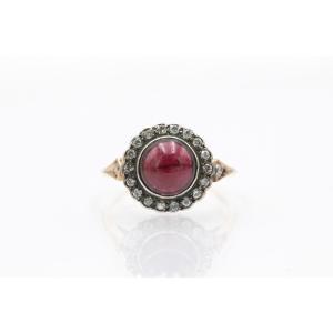 Antique Ring Set With A Cabochon-cut Garnet And Diamonds, First Half Of The 20th Century