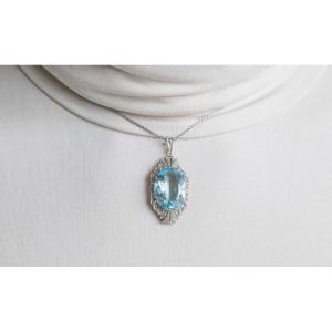 Art Deco Platinum Pendant With A 15.00 Ct Aquamarine And Diamonds, 1930s.