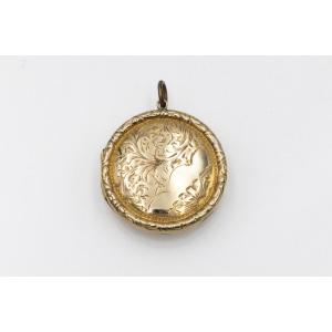 Antique Gold Medallion Engraved With A Plant Motif.