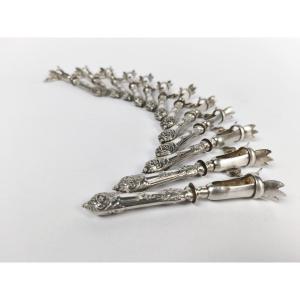 Twelve Silver-filled Chopped Handles In The Louis XV Style. Late 19th Century.