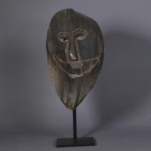 Smiling Figure Carved In A Palm Tree Stem – Himalayas