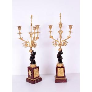 A Fine Pair Of Marble And Ormolu And Patinated Bronze Directoire Period Candelabra