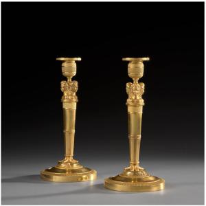 An Empire Ormolu Candlesticks