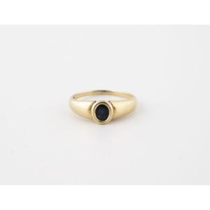 Yellow Gold (750) Band Ring Centered With A Faceted Oval Sapphire In A Closed Setting